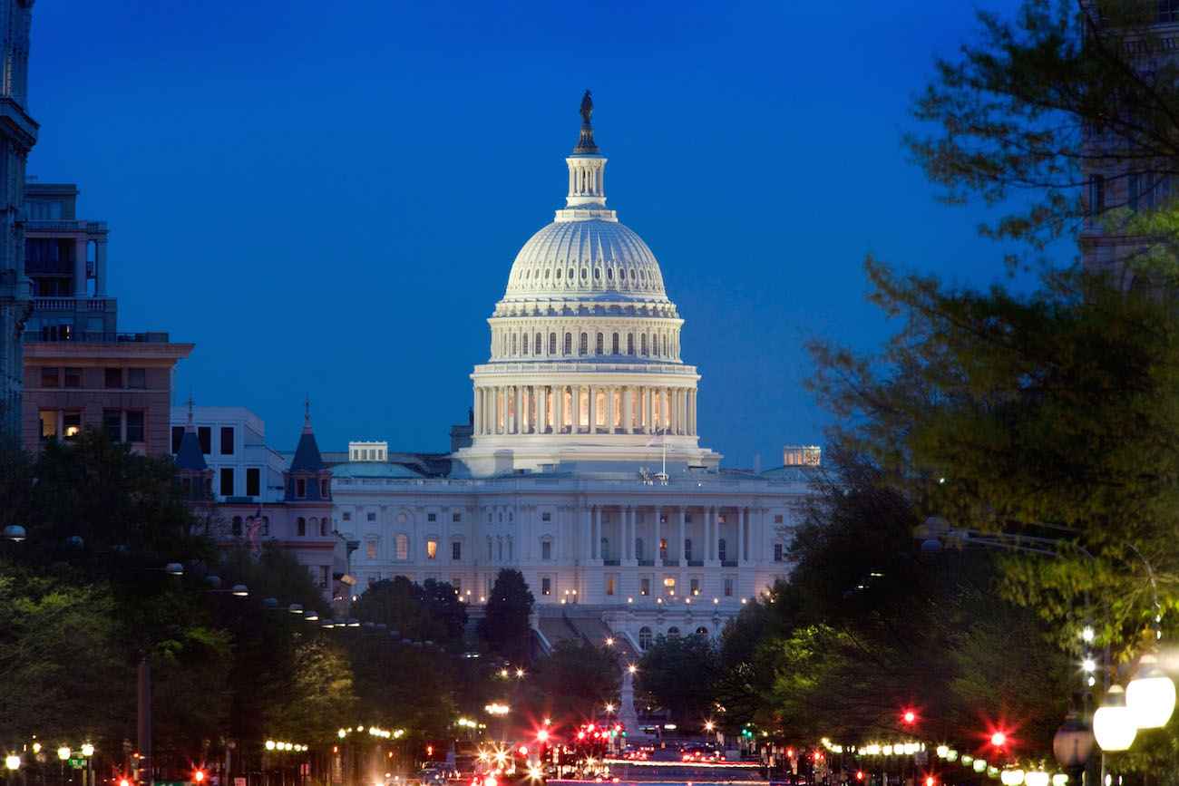 Pennsylvania Avenue and the United States Capitol Building at dusk. Downtown Washington DC D.C. US USA